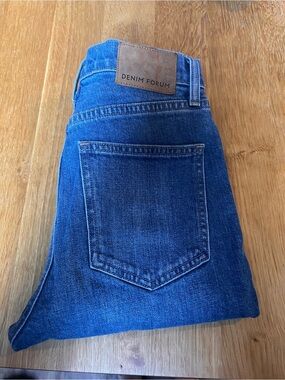 Denim Forum High-Rise Jeans in Blue with Brown Patch
